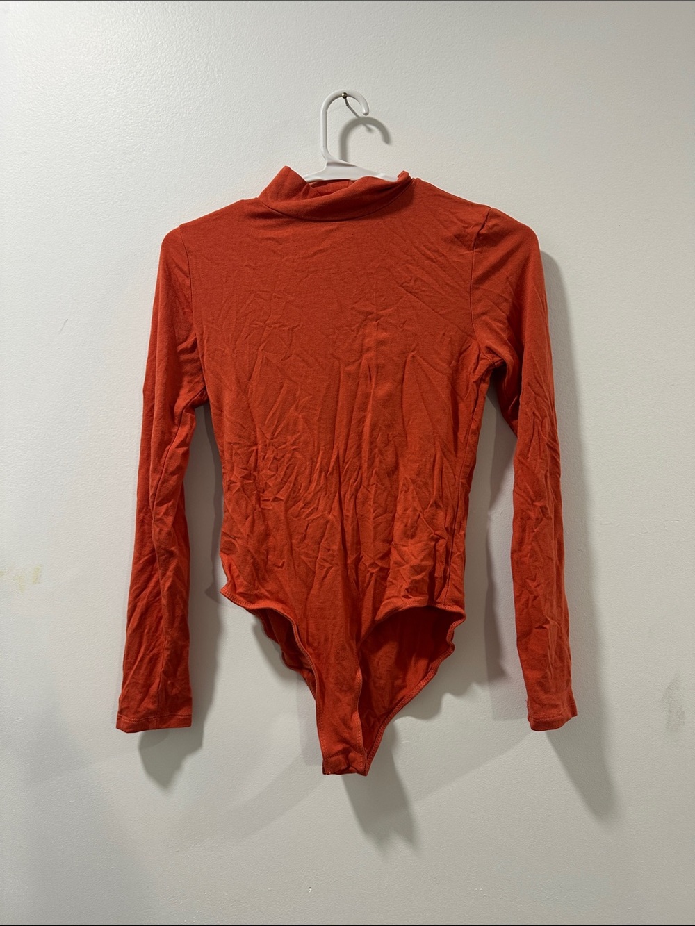 Women's Long-Sleeve Rust Bodysuit